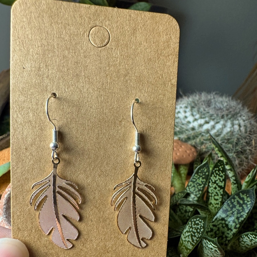 New handmade feather earrings.